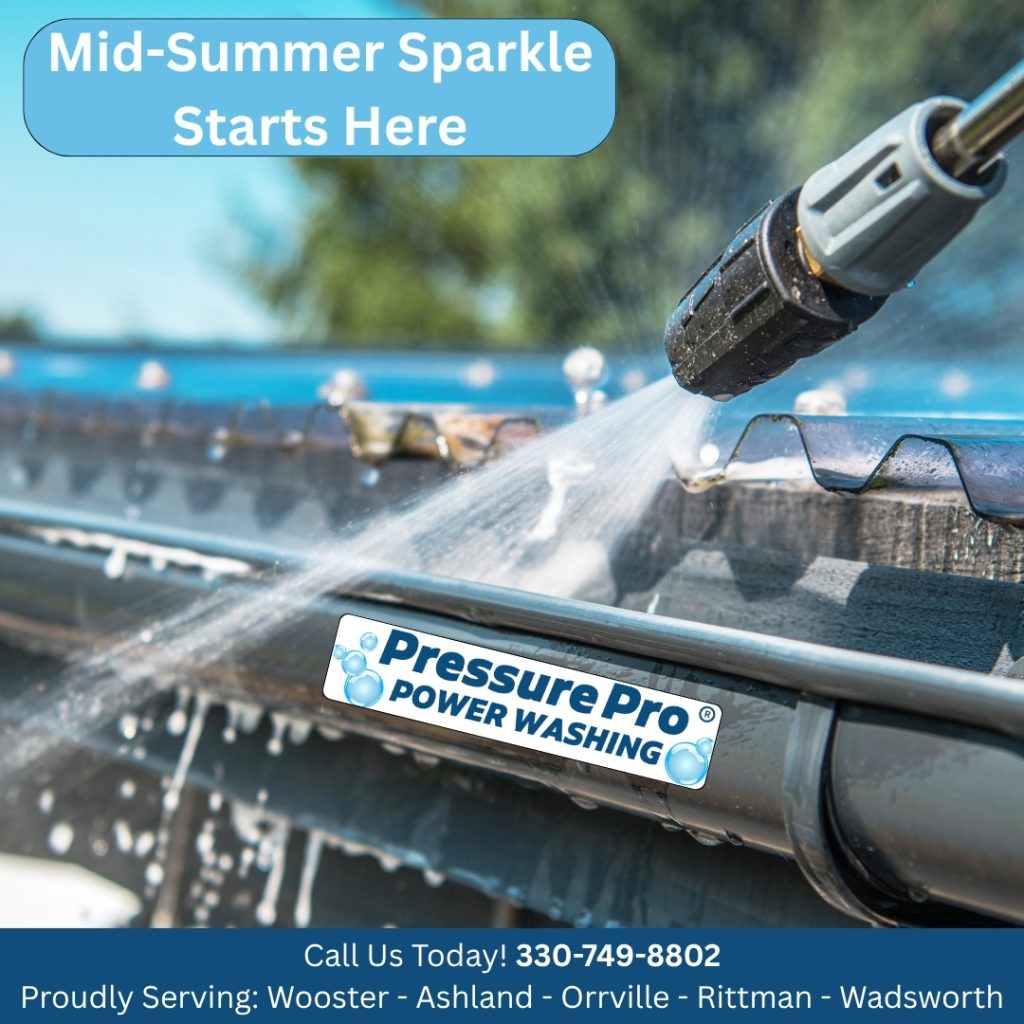 A pressure washer cleaning a gutter with water spray and soap, featuring a sign for Pressure Pro Power Washing with contact information and service areas.